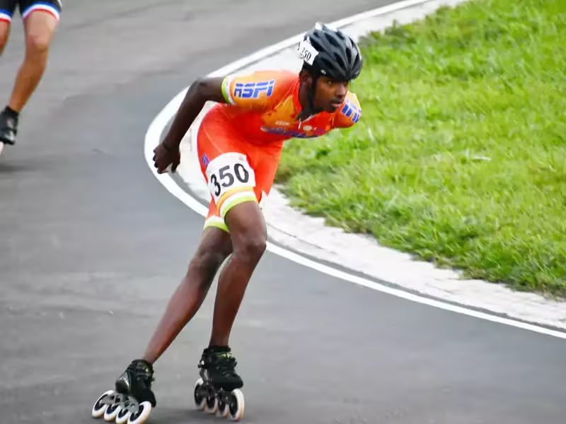 Speed skater in racing pose