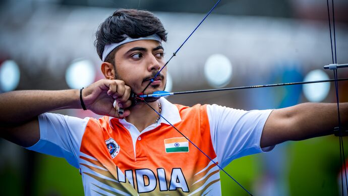Kushal Dalal drawing a bow